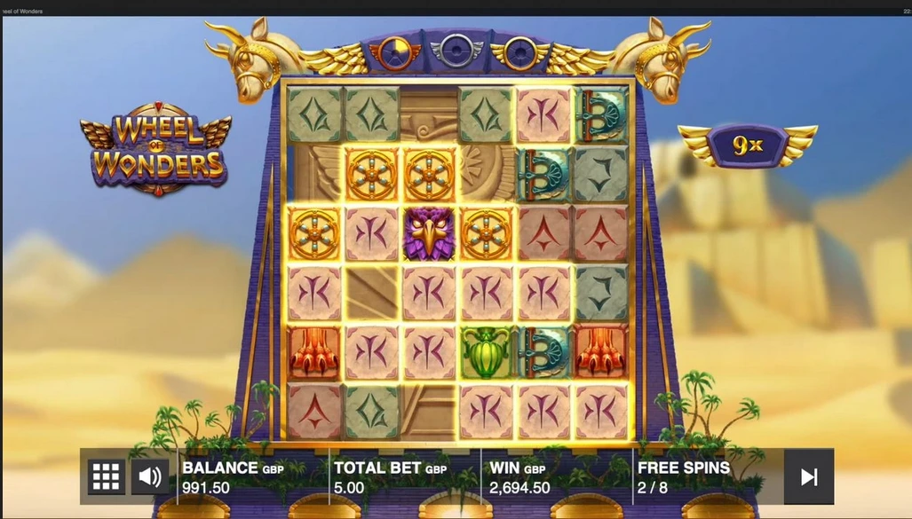 La grille du slot s'agrandit et l'Ancient Wheel se déclenche
